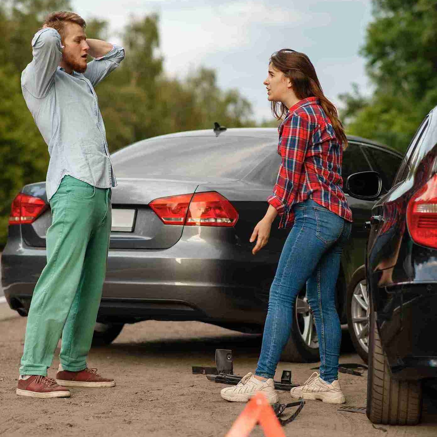 car-accident-on-road-man-and-woman-are-sorted-out-2024-12-05-15-42-48-utc_11zon